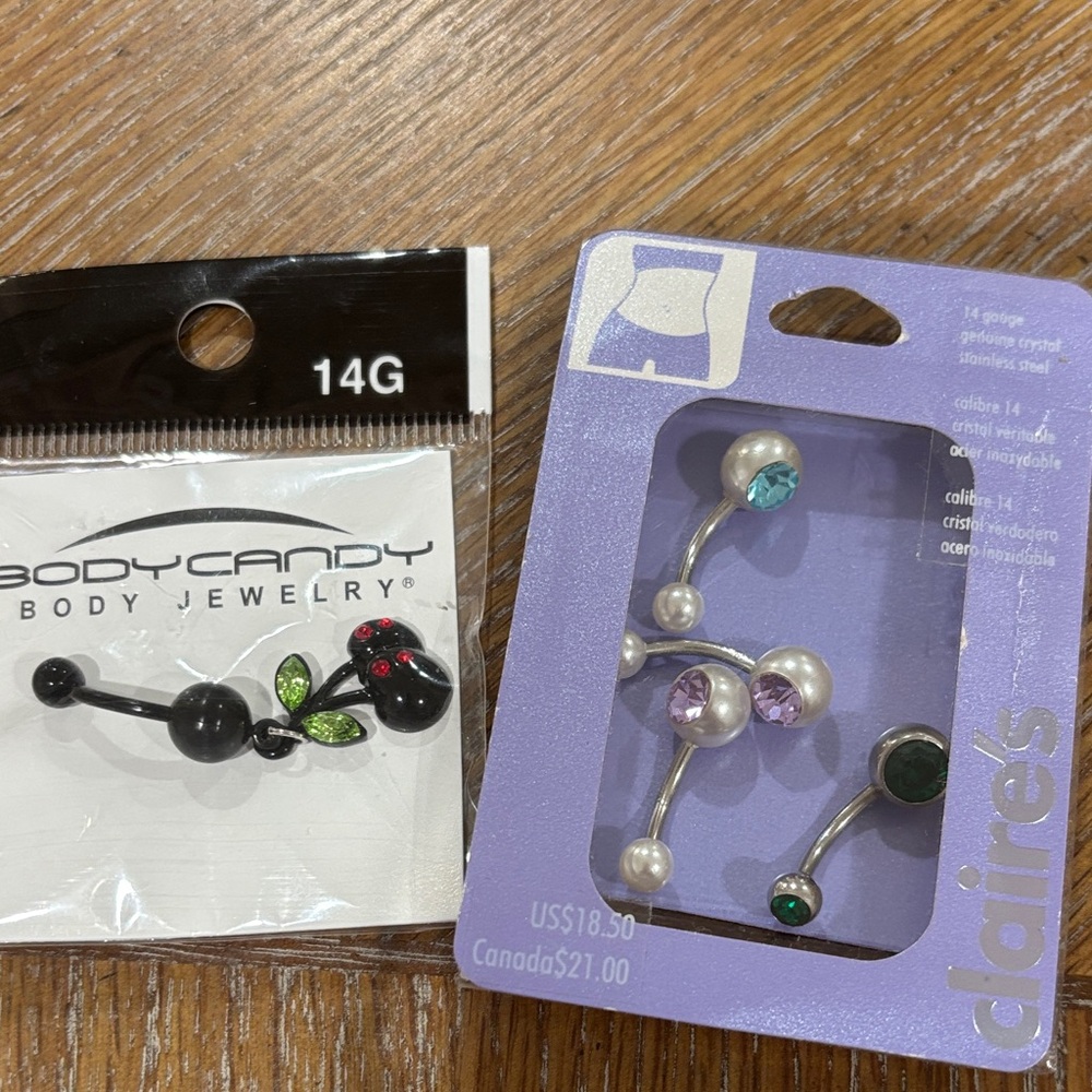 BodyCandy Black and Green Cherry Belly Button Ring and Claire’s multi color ring
